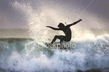 ist2_4294859-surfer-on-the-lip-of-a-wave